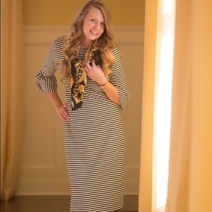 Dainty Jewel’s Striped Maxi Dress